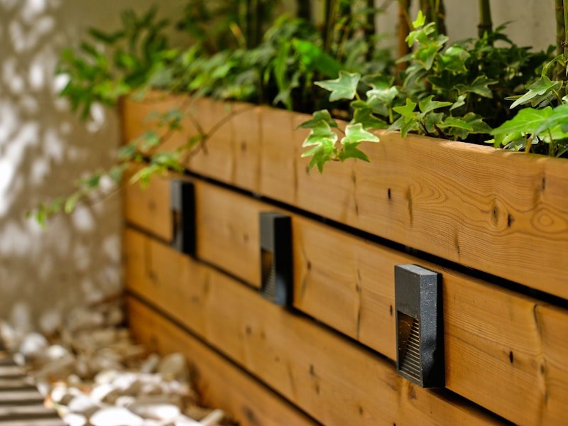 Urban permaculture small yard with raised beds and vertical trellis