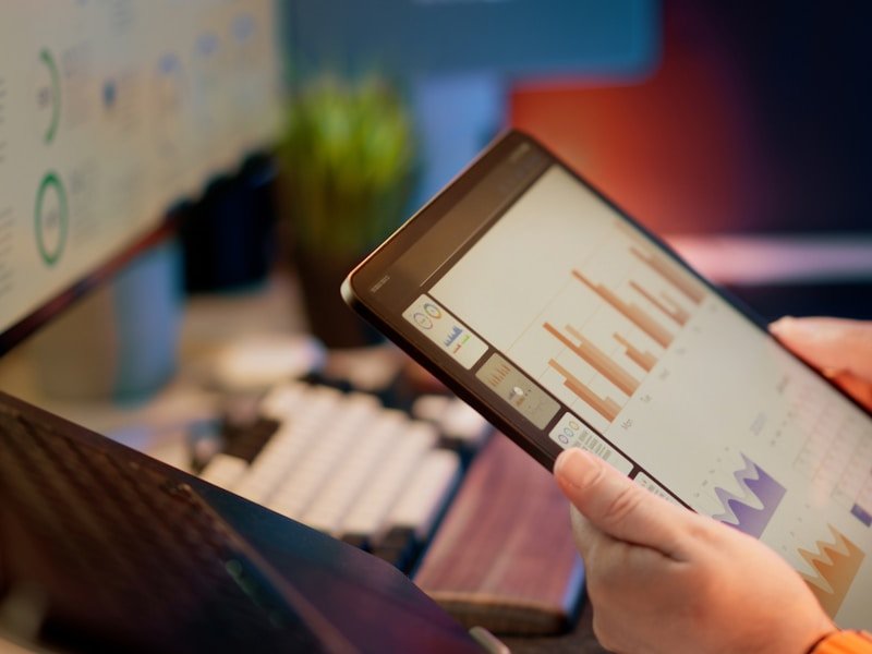 Facility manager reviewing watering schedule data from a tablet