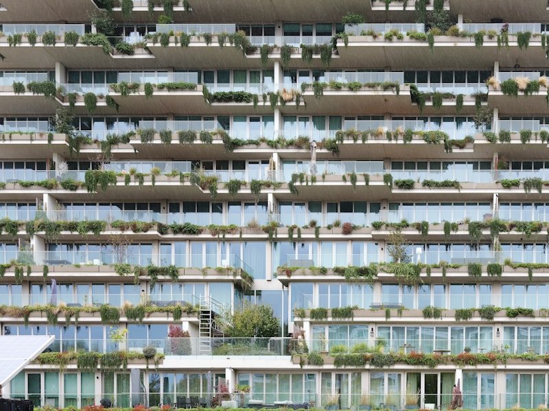 Vertical balcony garden installation on a high-rise residential building