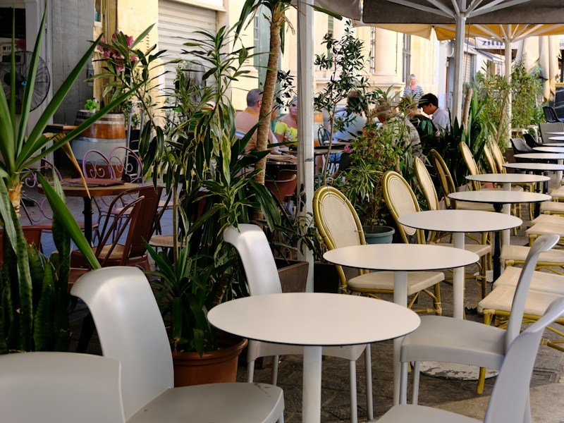 Commercial rooftop container garden with sub-irrigated planters on a restaurant terrace